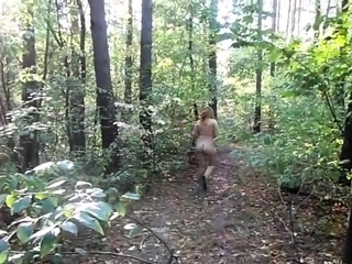 chubby girl with big booty walking nude in forest