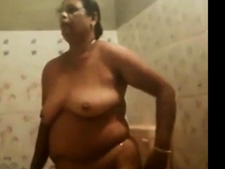 Desi Aunt spied on washing her chubby body