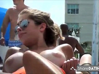 Beauty with gorgeous tits at swim pool